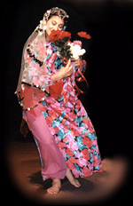 Judith in costume performing with Voices of Sepharad